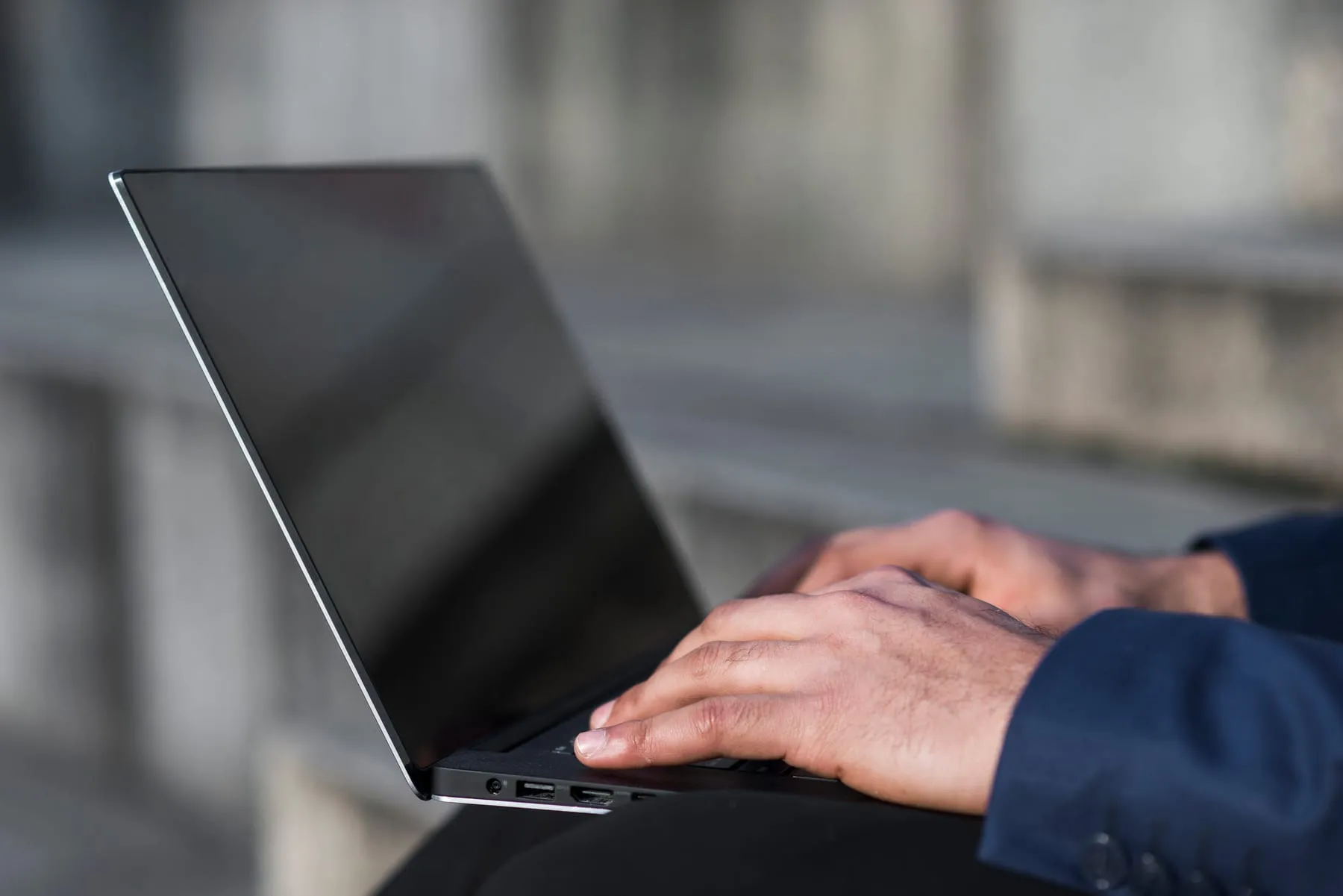 Close up man working laptop