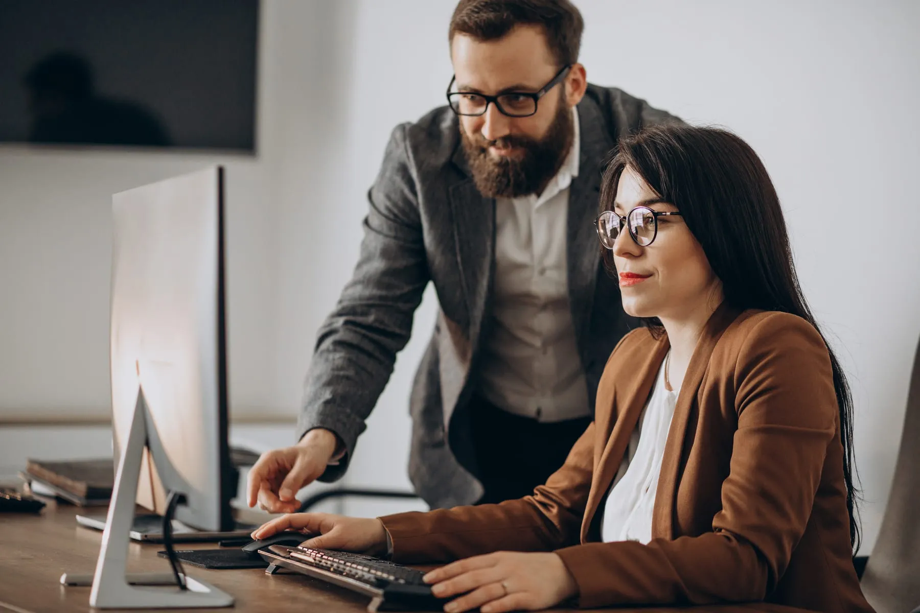 Two business partners working together office computer copy